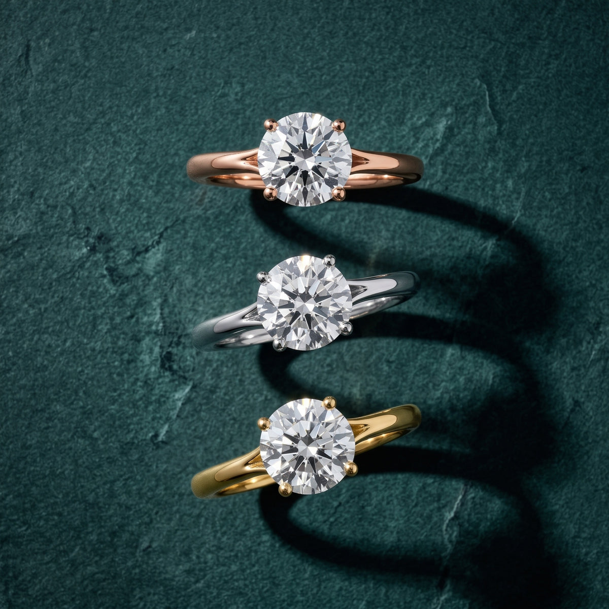 Melanie Solitaire Split Shank Round Diamond Engagement Ring in Silver - 3rings.jpg
