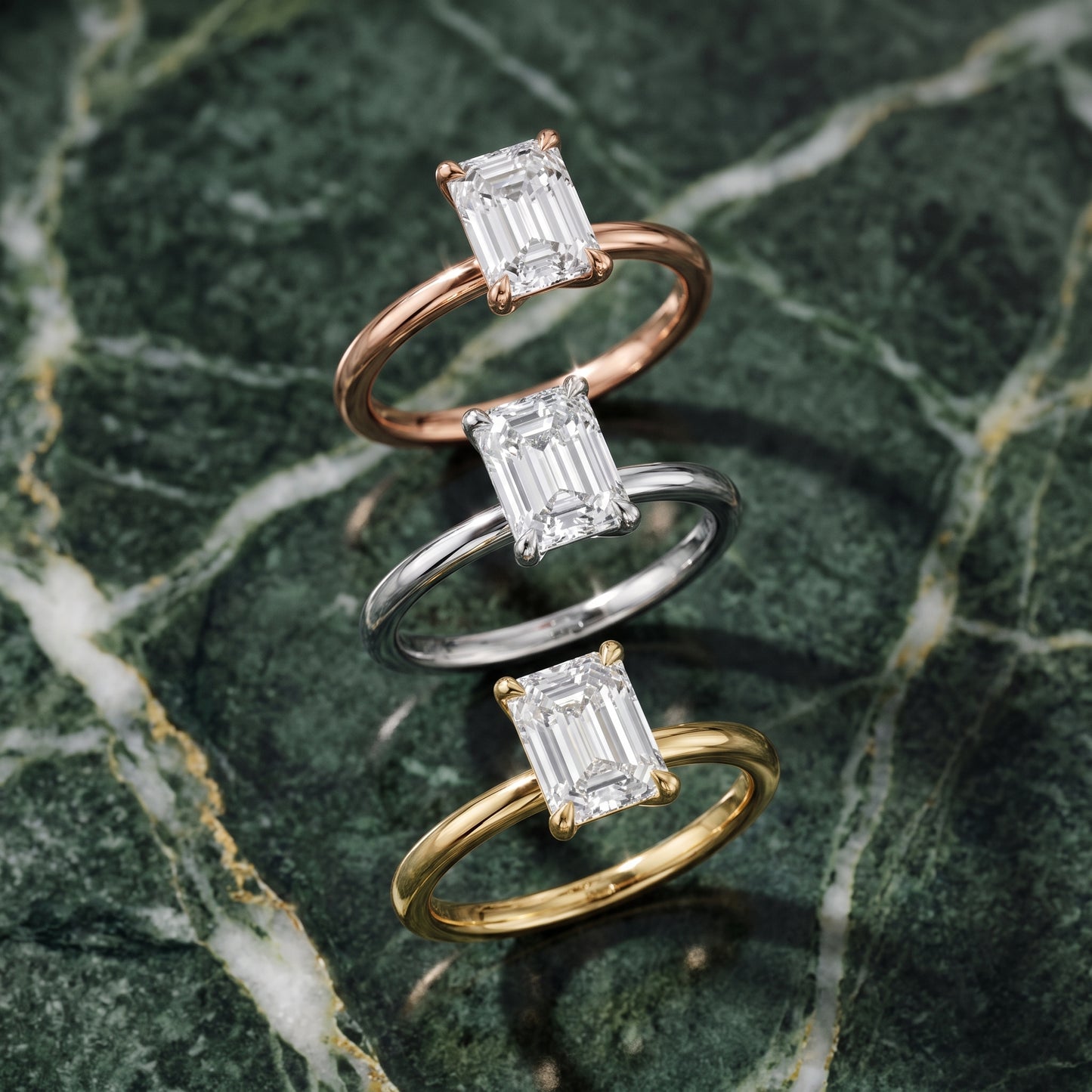Nella Petite Solitaire Emerald Diamond Engagement Ring in White Gold - 3rings.jpg