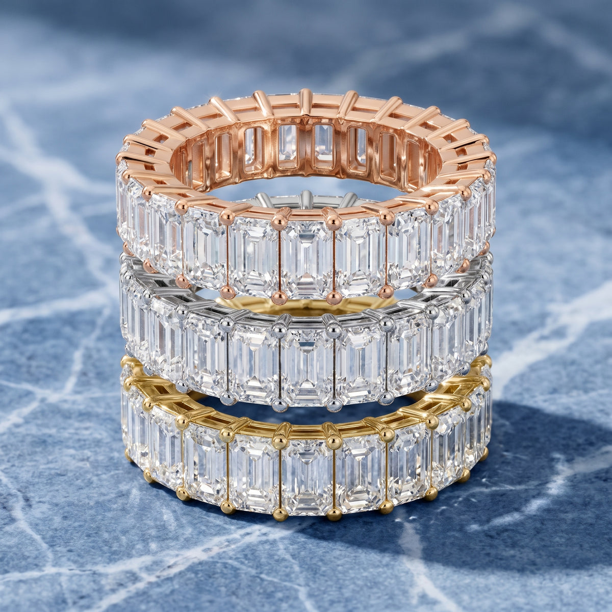 Adelaide Shared Prong Emerald Diamond Eternity Band in Platinum - 3rings.jpg
