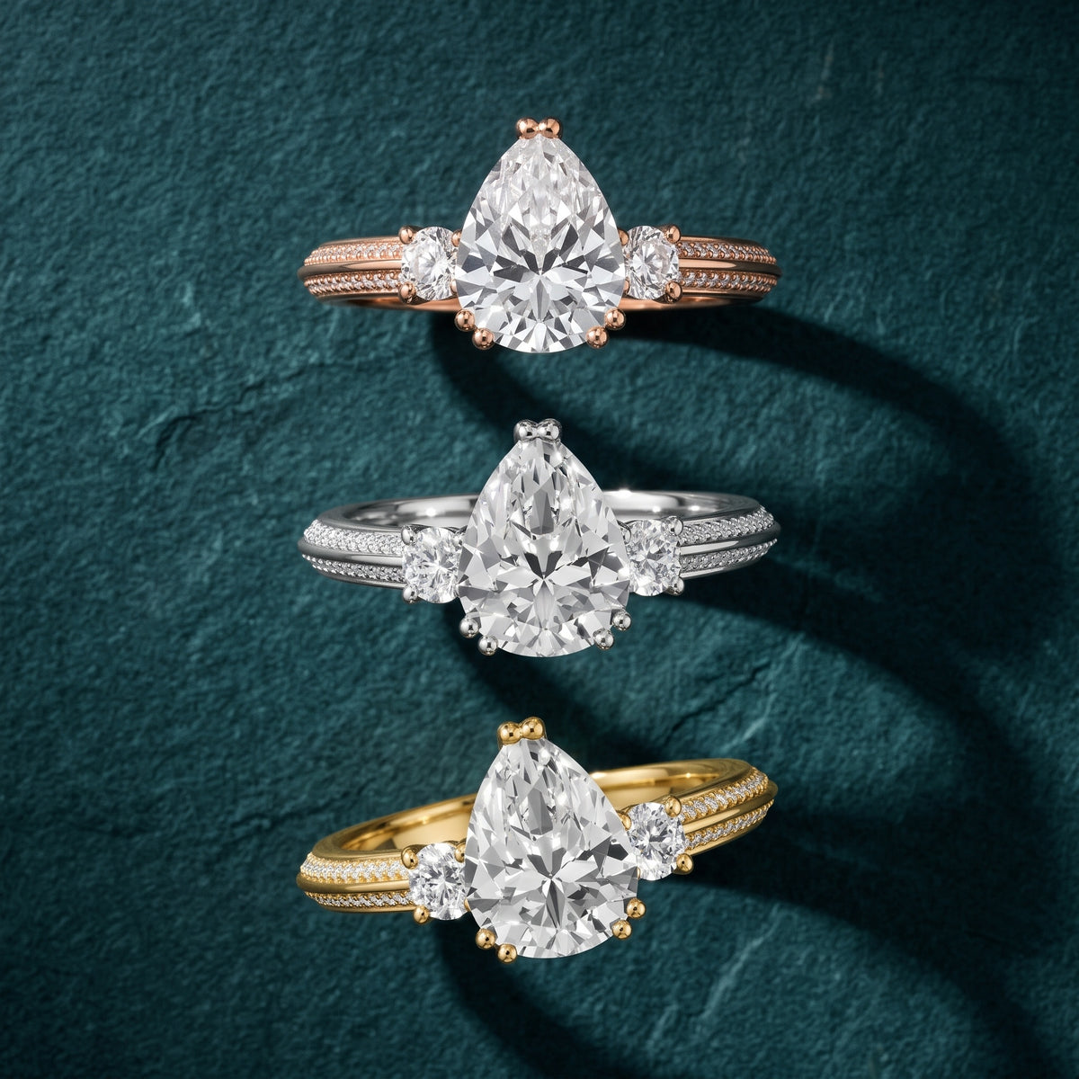 Aspen Three-Stone Knife Edge Pear Diamond Engagement Ring in Platinum - 3rings.jpg