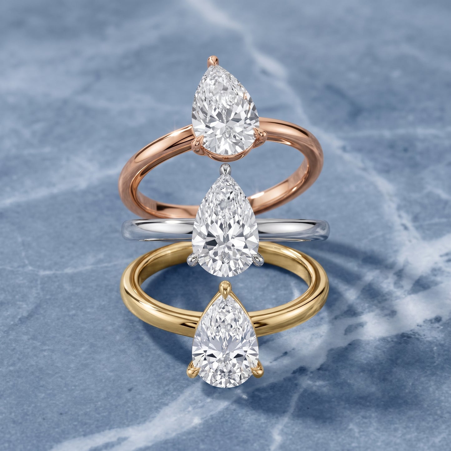 Lyla Petite Solitaire Pear Diamond Engagement Ring in Rose Gold - 3rings.jpg