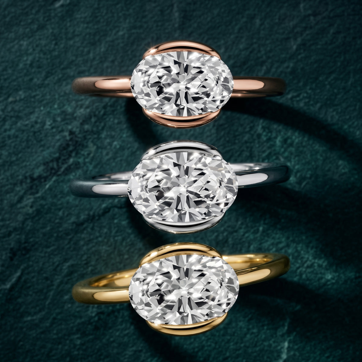 Mathilde East-West Half Bezel Oval Diamond Engagement Ring in Rose Gold - 3rings.jpg