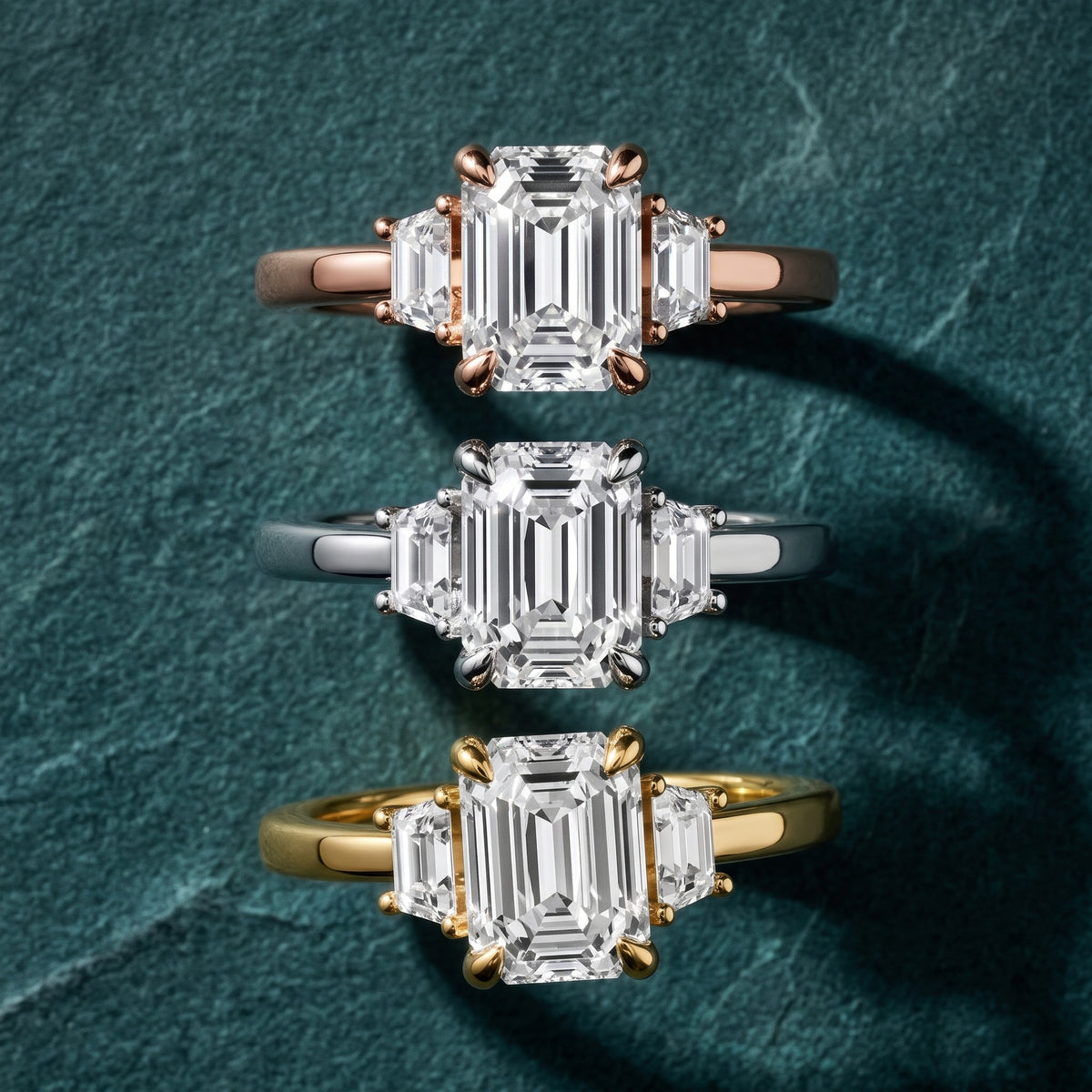 Eureka Trapezoid Three-Stone Emerald Diamond Engagement Ring in Platinum - 3rings.jpg