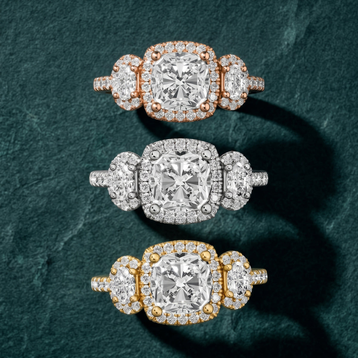 Austin Three-Stone Halo Cushion Diamond Engagement Ring in Platinum - 3rings.jpg