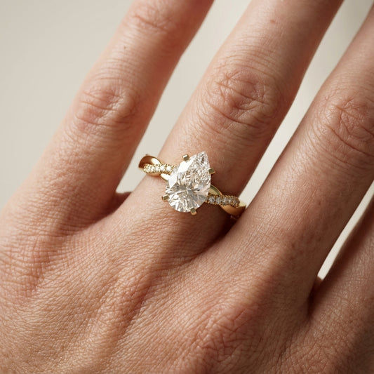 Pear Cut Lab Grown Diamond Twisted Engagement Ring in Yellow Gold