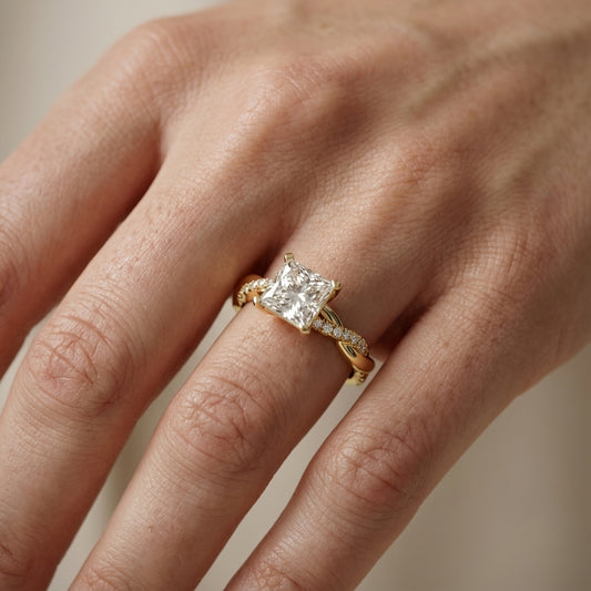 Princess Cut Lab Grown Diamond Twisted Side Stone Engagement Ring in Yellow Gold