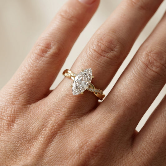 Marquise Cut Lab Grown Diamond Twisted Engagement Ring in Yellow Gold
