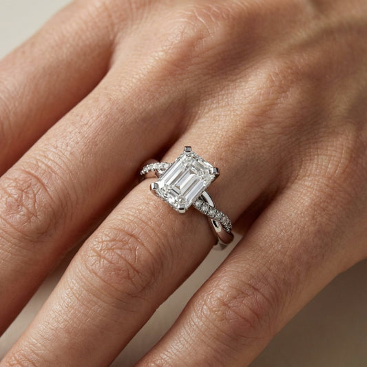 Emerald Cut Lab Grown Diamond Twisted Side Stone Engagement Ring in Silver
