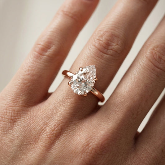 Pear Cut Lab Grown Diamond Solitaire Engagement Ring in Rose Gold showing side profile