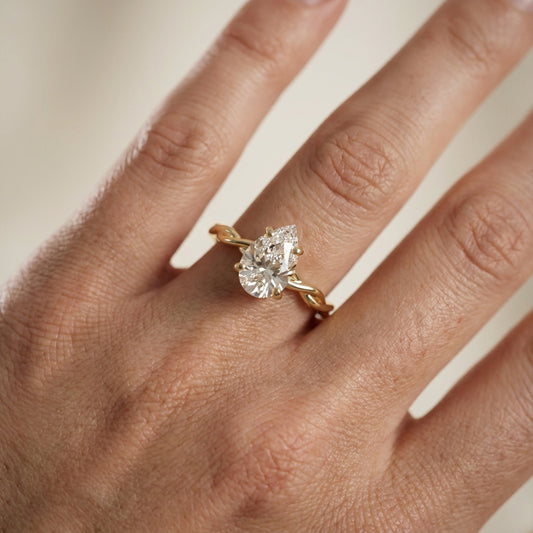 Pear Cut Lab Grown Diamond Solitaire Engagement Ring with Twisted Shank in Yellow Gold