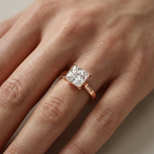 Princess Cut Lab Grown Diamond Solitaire Engagement Ring in Rose Gold showing side profile.