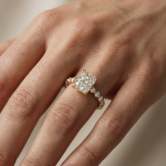 Radiant Cut Lab Grown Diamond Engagement Ring with Side Stones in Yellow Gold