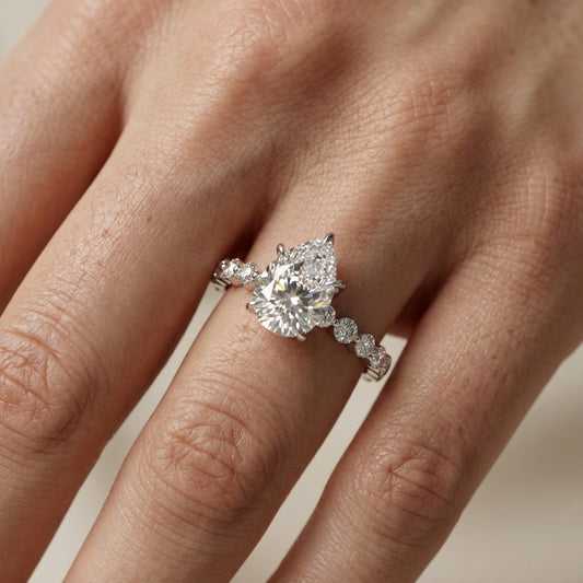 Pear Cut Lab Grown Diamond Engagement Ring with floating side stones in Platinum