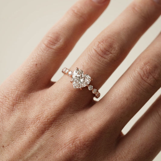 Heart Cut Lab Grown Diamond Side Stone Engagement Ring in Rose Gold setting