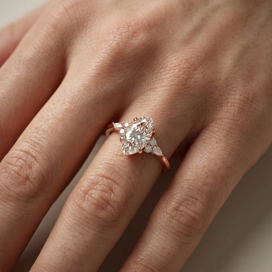 Marquise Cut Lab Grown Diamond Engagement Ring with side stone clusters set in Rose Gold