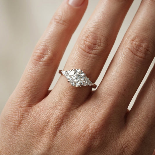 Round Cut Lab Grown Diamond Three Stone Engagement Ring in Platinum