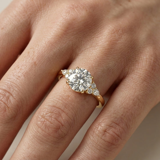 Round Cut Lab Grown Diamond Three Stone Engagement Ring in Yellow Gold