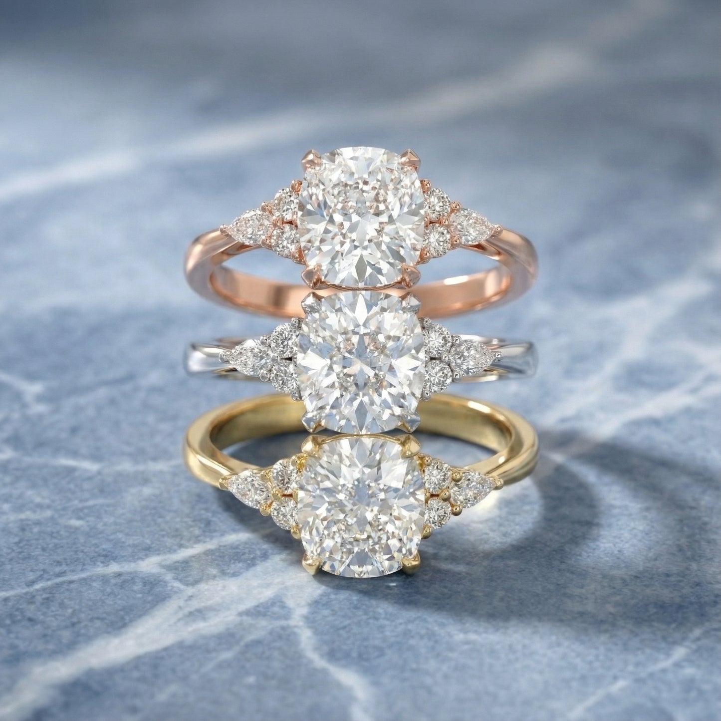 Cushion Cut Lab Grown Diamond Three Stone Engagement Ring in Yellow Gold