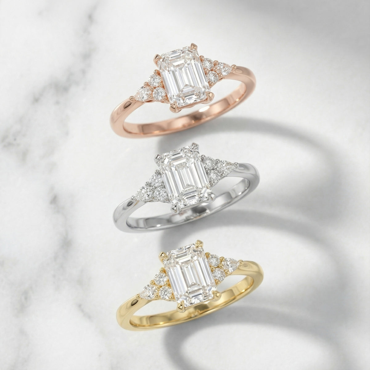 Emerald Cut Lab Grown Diamond Engagement Ring with side stone clusters set in Silver