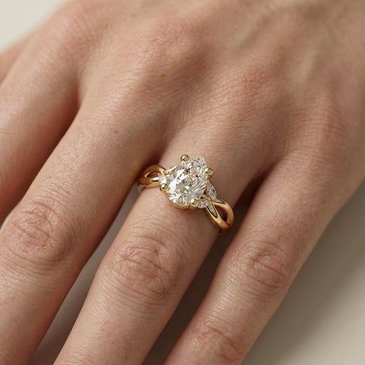 Pear Cut Lab Grown Diamond Twisted Engagement Ring in Yellow Gold