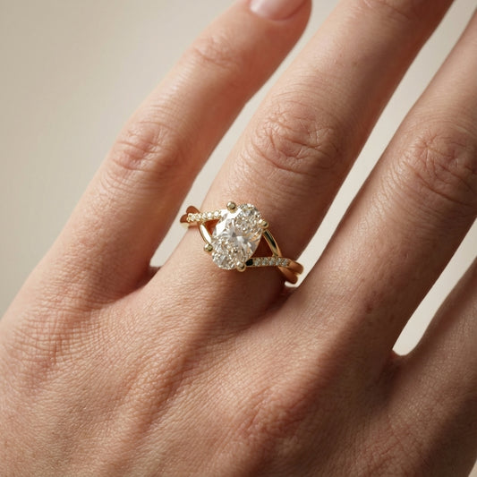 Oval Cut Lab Grown Diamond Engagement Ring in Yellow Gold with twisted pave band