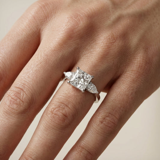 Princess Cut Lab Grown Diamond Three Stone Engagement Ring in White Gold with pear side stones