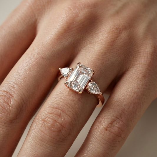 Grace Three Stone Emerald Cut Lab Grown Diamond Engagement Ring set in Rose Gold