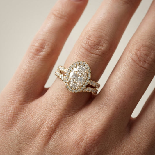 Oval Cut Lab Grown Diamond Halo Engagement Ring with Split Shank in Yellow Gold