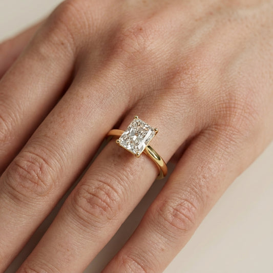 Radiant Cut Lab Grown Diamond Solitaire Engagement Ring in Yellow Gold showing hidden details