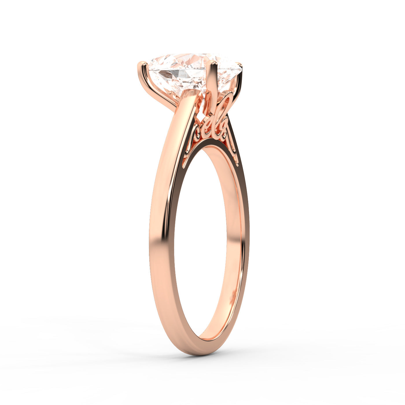 Pear Cut Lab Grown Diamond Solitaire Engagement Ring in Rose Gold showing side profile scrollwork