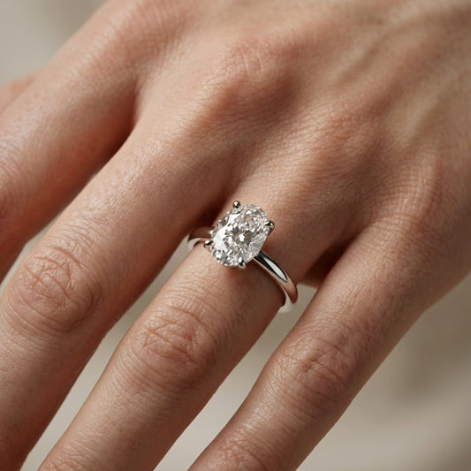 Oval Cut Lab Grown Diamond Engagement Ring in Silver with chevron under-bezel detail