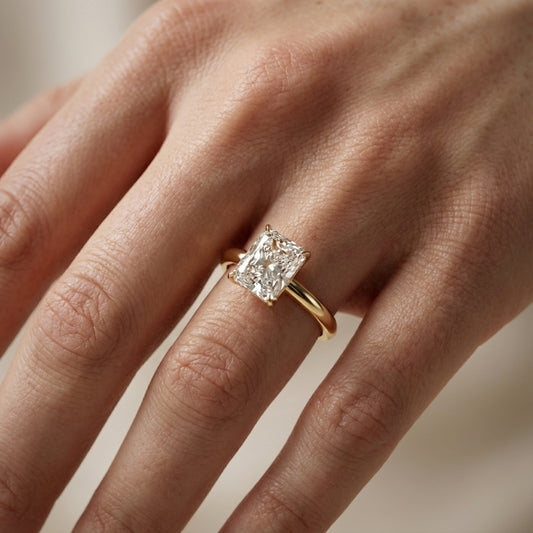 Radiant Cut Lab Grown Diamond Solitaire Engagement Ring in Yellow Gold showing floral details