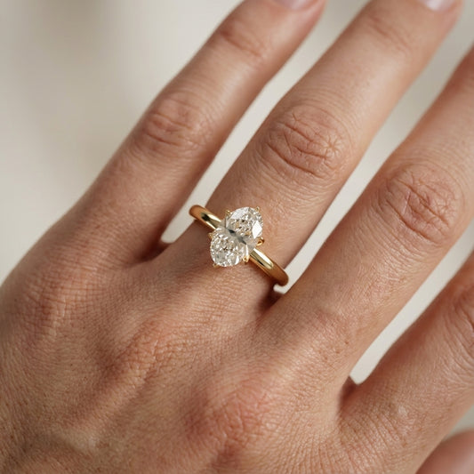 Oval Cut Lab Grown Diamond Solitaire Engagement Ring in Yellow Gold with six prong setting.