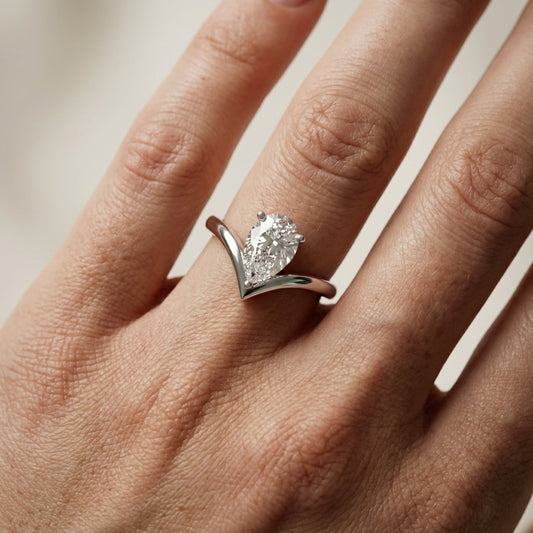 Pear Cut Lab Grown Diamond Chevron Solitaire Engagement Ring in Platinum