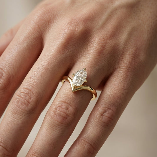 Oval Cut Lab Grown Diamond Chevron Solitaire Engagement Ring in Yellow Gold