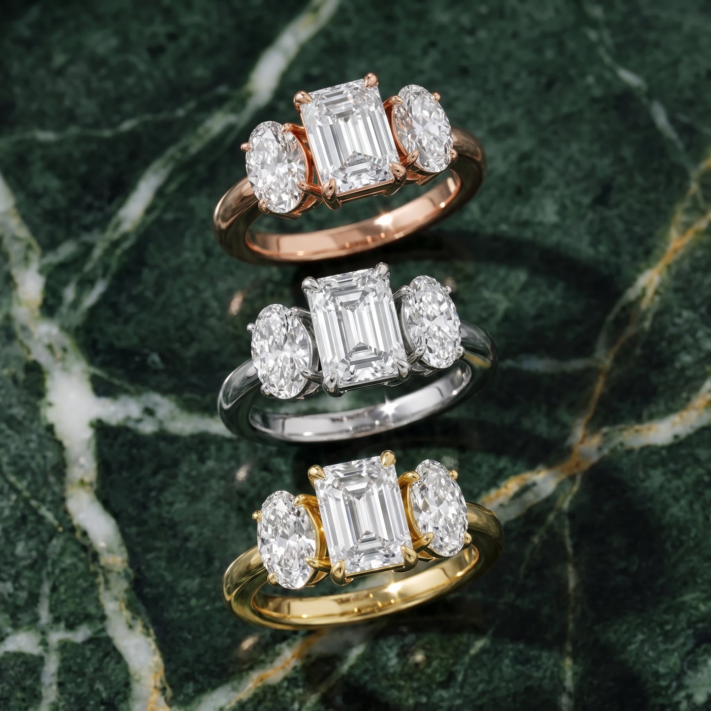 Lila Three-Stone Emerald Diamond Ring in Platinum - 3rings.jpg