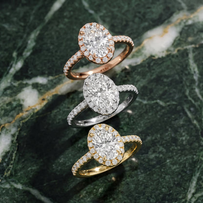 Amara Halo Claw Prong Oval Diamond Ring in White Gold - 3rings.jpg