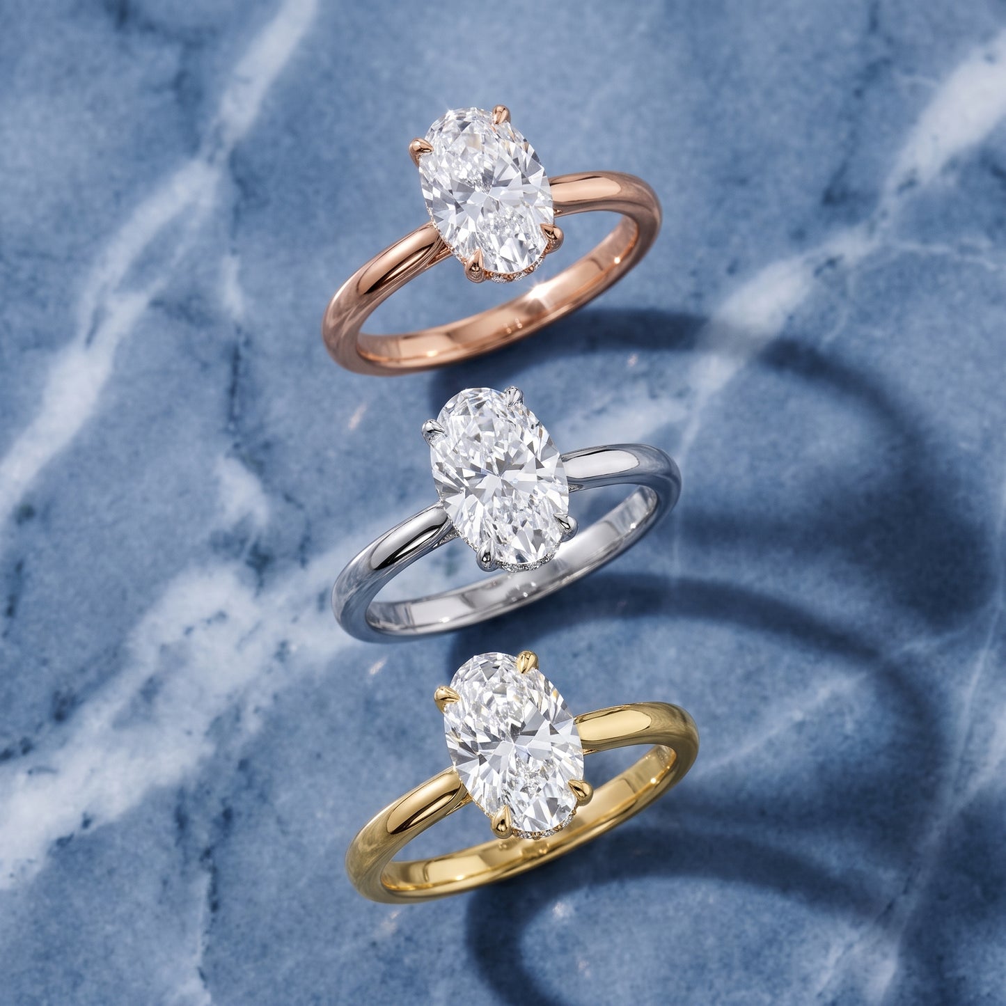 Mena Hidden Halo Oval Diamond Engagement Ring in Platinum - 3rings.jpg