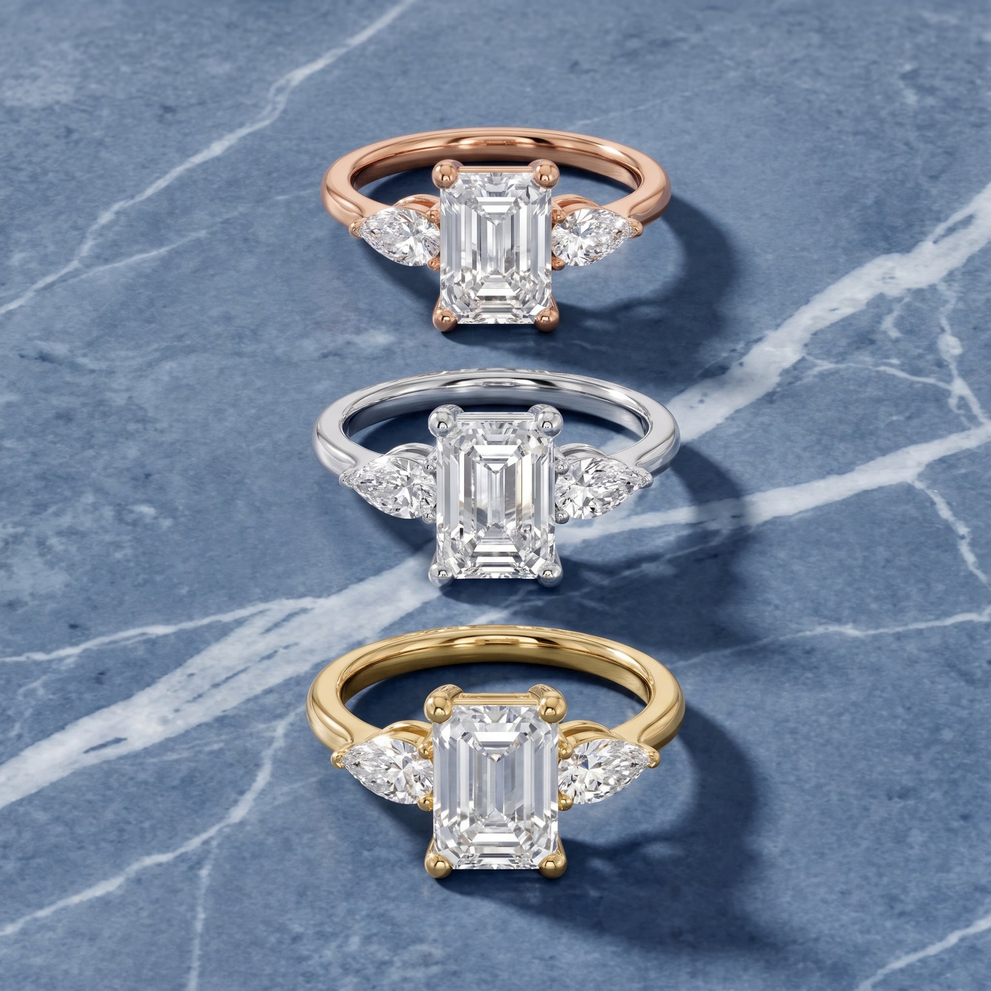 Faye Three-Stone Trellis Emerald Diamond Ring in Platinum - 3rings.jpg