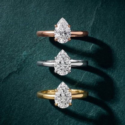 Charlotte Charm Solitaire Pear Diamond Engagement Ring in Rose Gold - 3rings.jpg