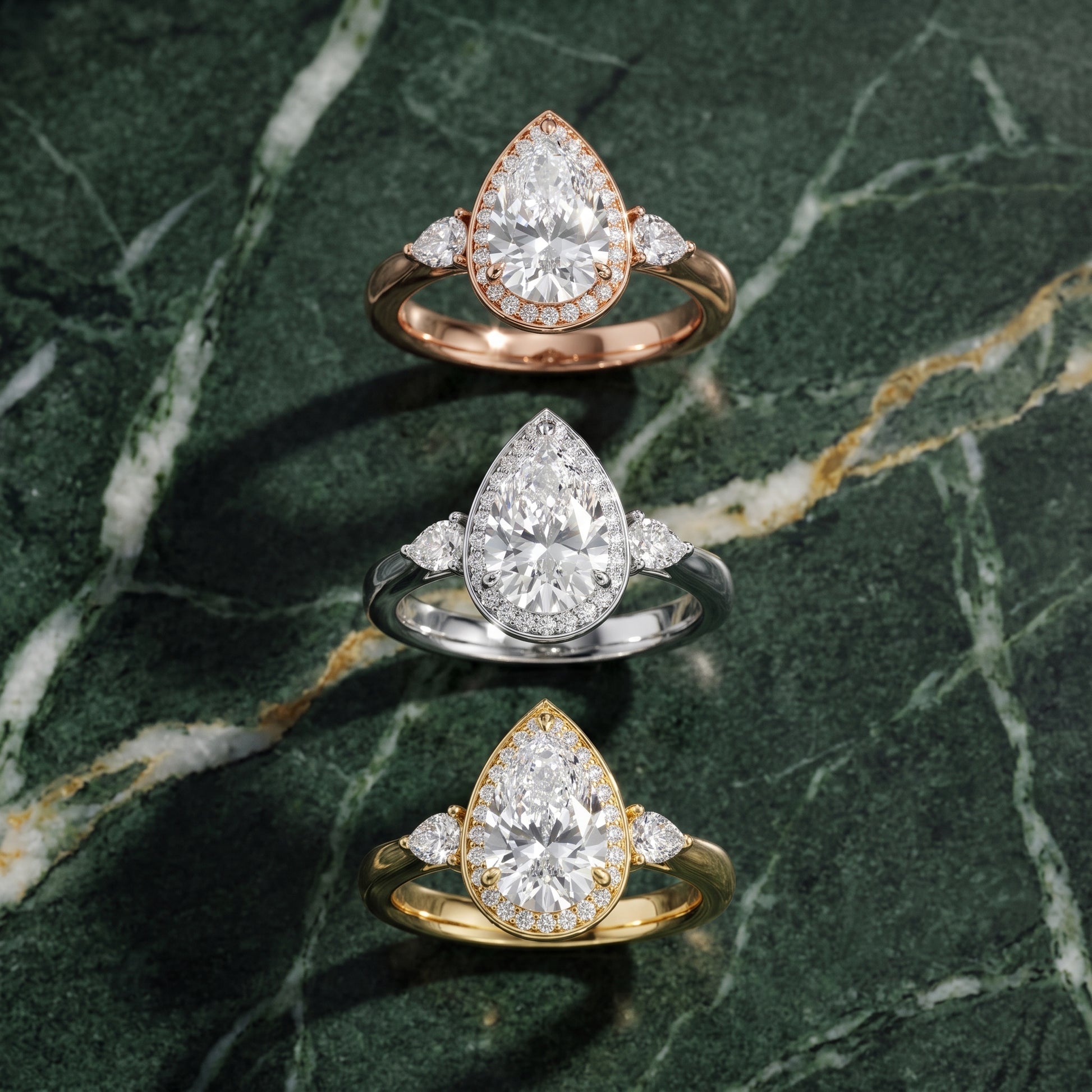 Eliza Halo Sidestone Pear Diamond Engagement Ring in White Gold - 3rings.jpg