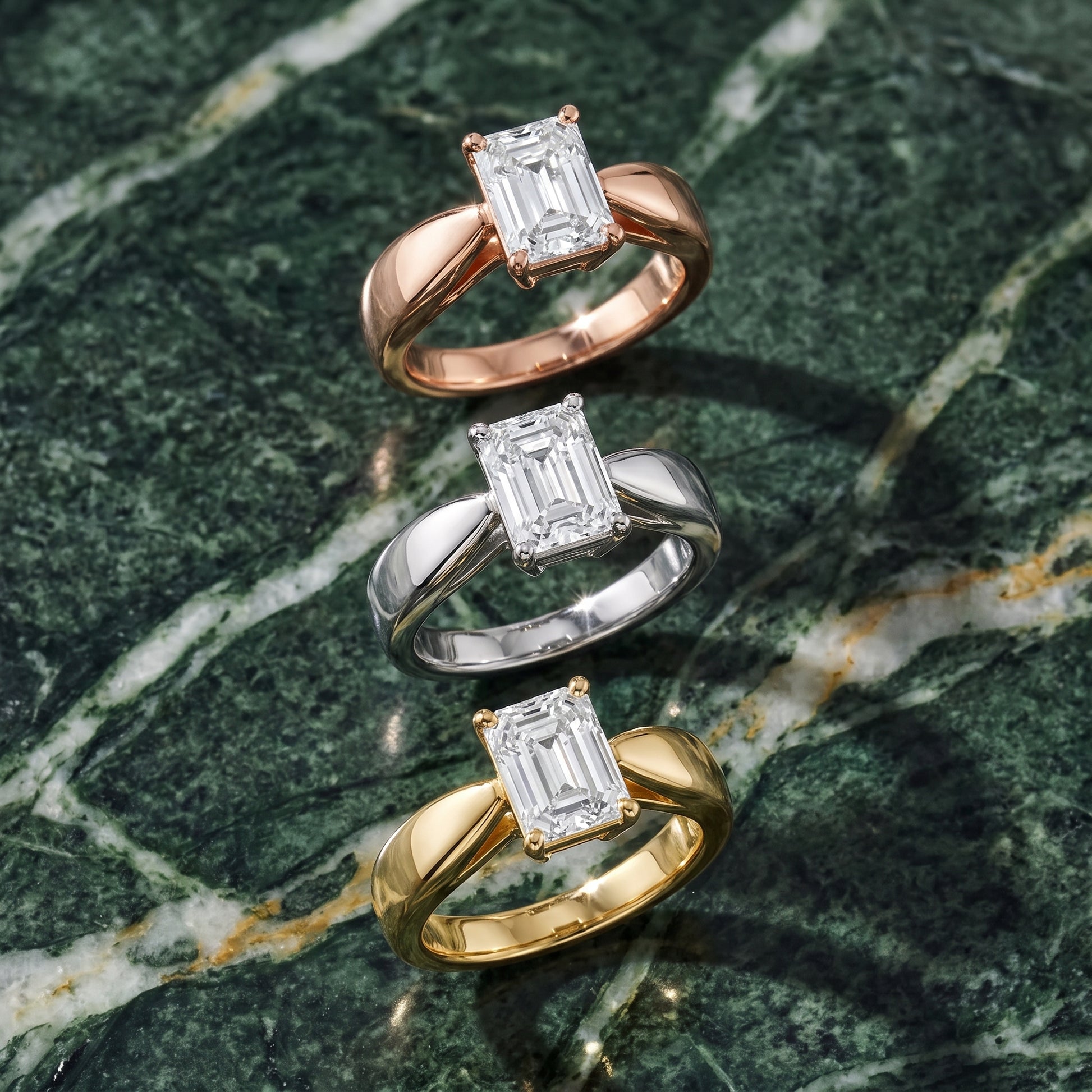 Talia Solitaire Twist Emerald Diamond Engagement Ring in Yellow Gold - 3rings.jpg