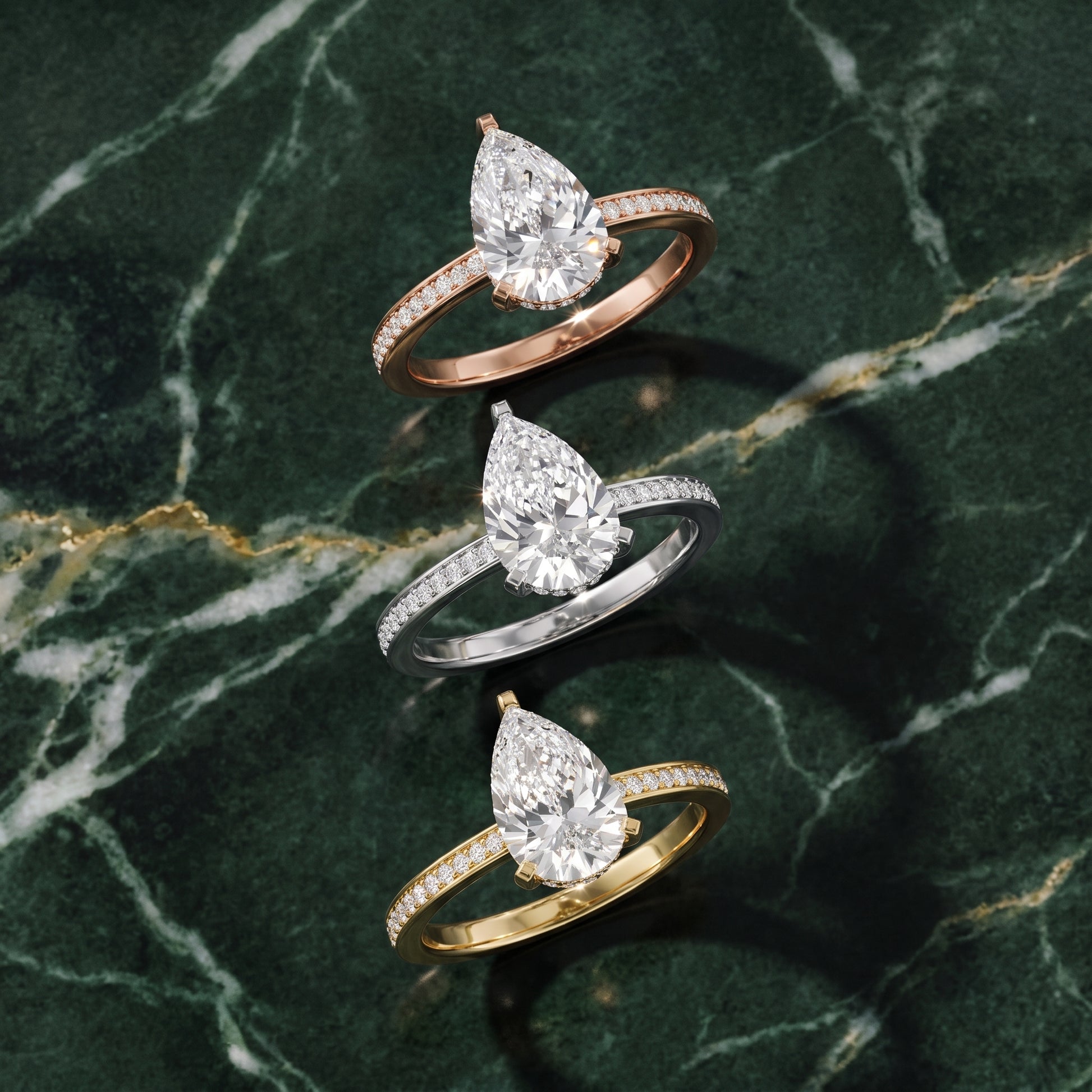 Naia Hidden Halo Pear Diamond Ring in Silver - 3rings.jpg