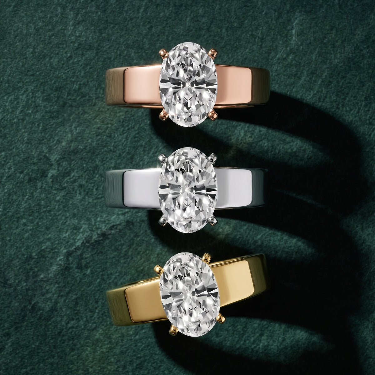 Susannah Wide Band Solitaire Oval Diamond Engagement Ring in Yellow Gold - 3rings.jpg