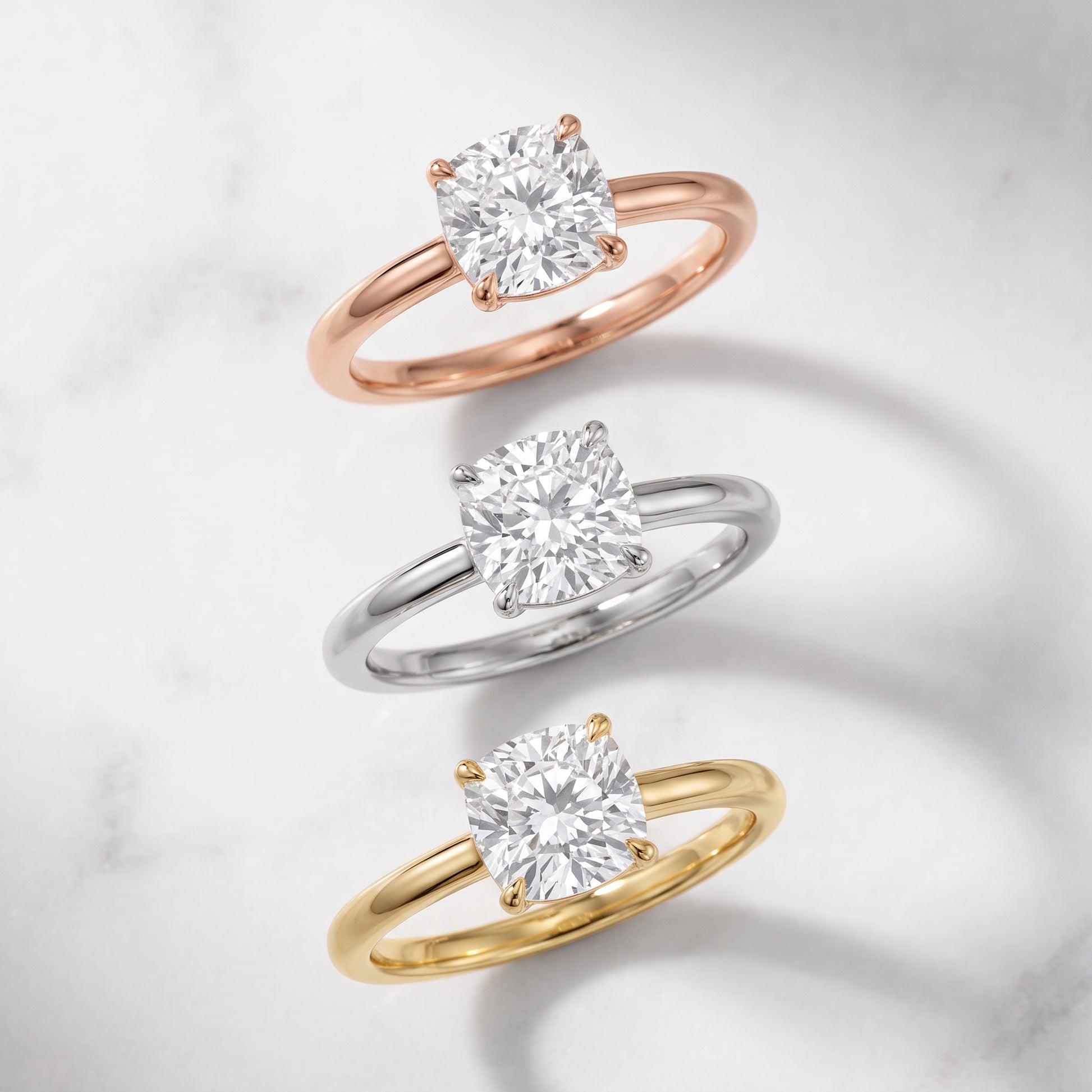 Sadie Cathedral Solitaire Cushion Diamond Ring in Yellow Gold - 3rings.jpg