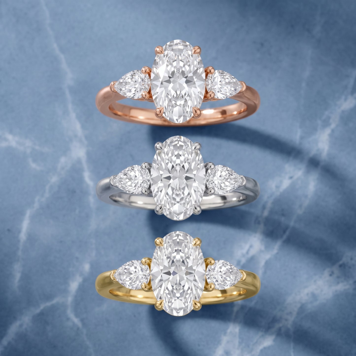 Mirabel Three-Stone Oval Diamond Engagement Ring in Yellow Gold - 3rings.jpg