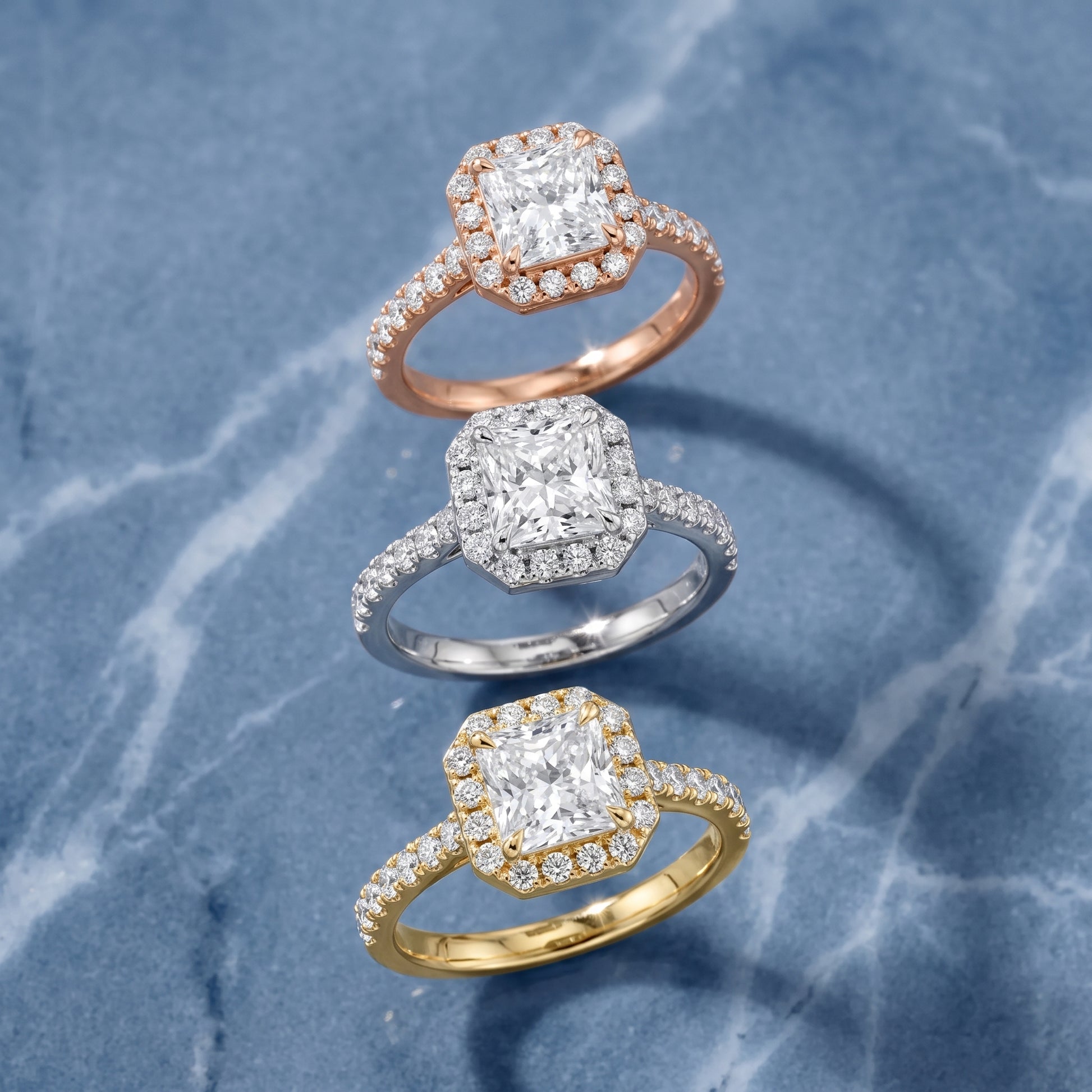 Amara Halo Claw Prong Radiant Diamond Ring in White Gold - 3rings.jpg