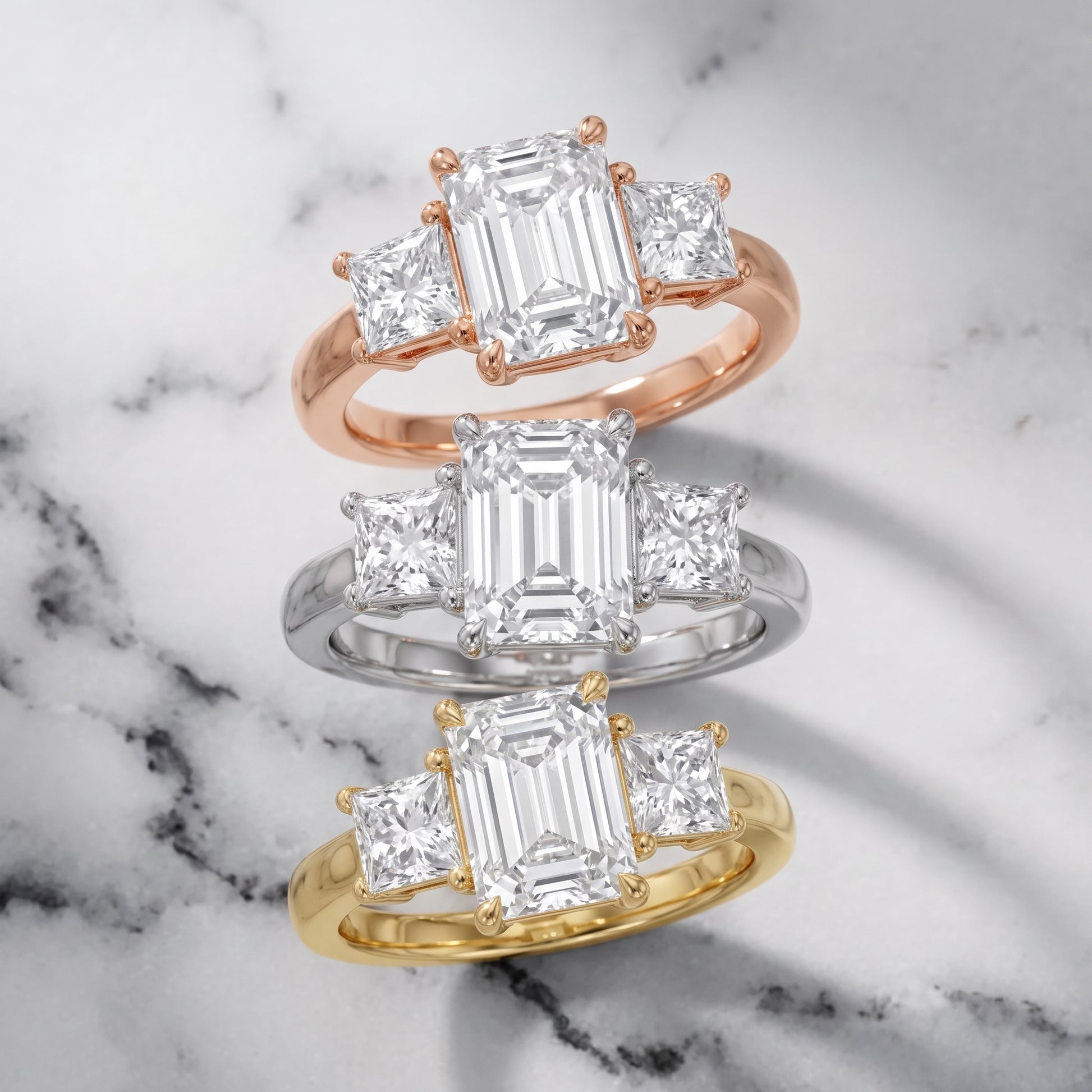 Sienna Three-Stone Emerald Diamond Ring in Yellow Gold - 3rings.jpg