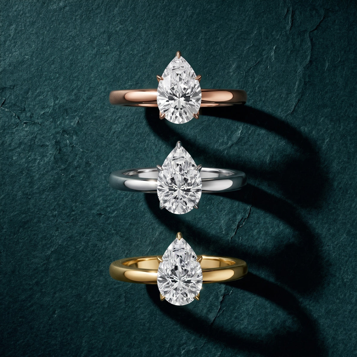Serena Blossom Solitaire Pear Diamond Engagement Ring in Yellow Gold - 3rings.jpg