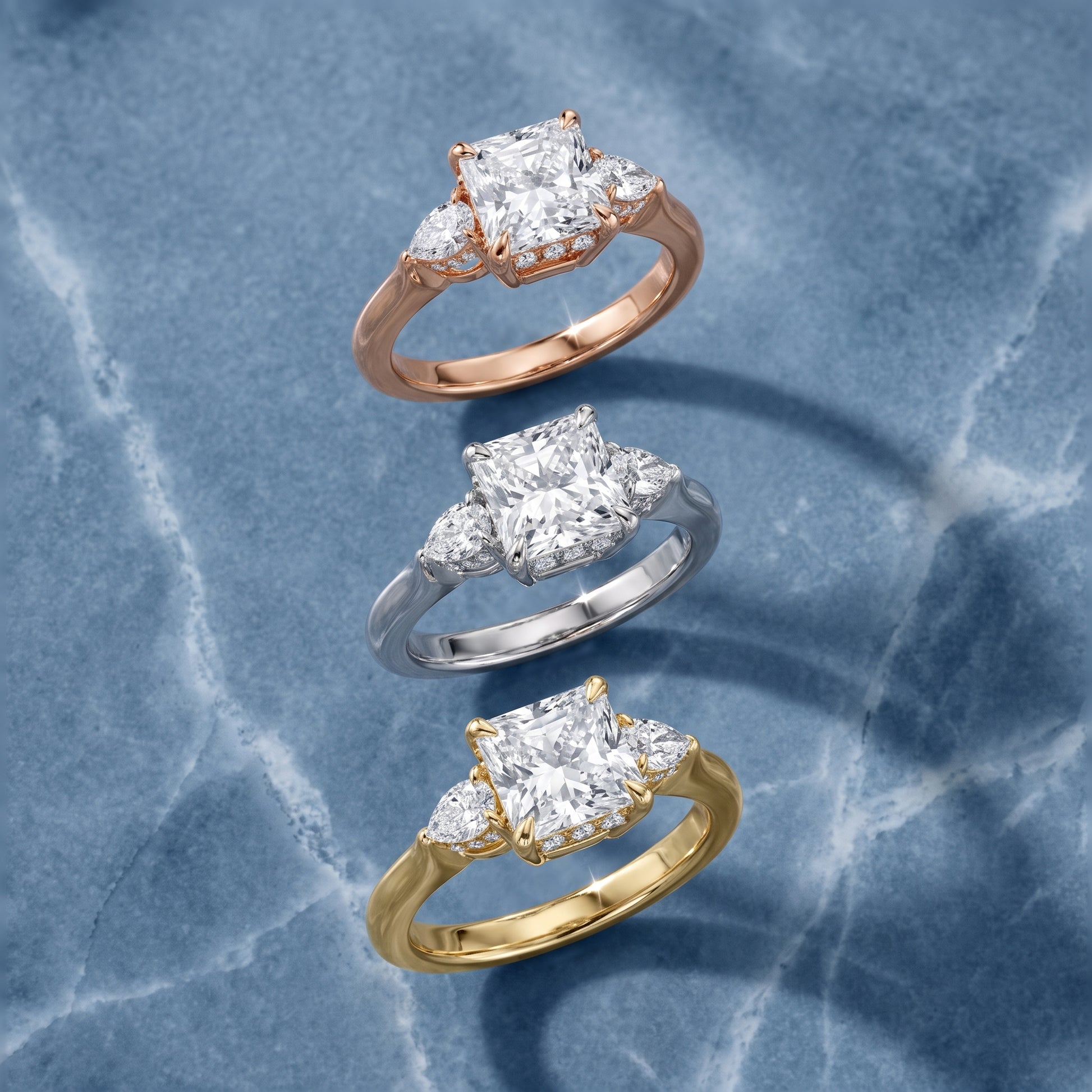 Leila Three-Stone Radiant Diamond Engagement Ring in Yellow Gold - 3rings.jpg